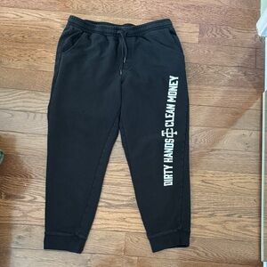 Troll Co “dirty hands clean money” black joggers - L